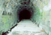 Just a few feet inside the tunnel